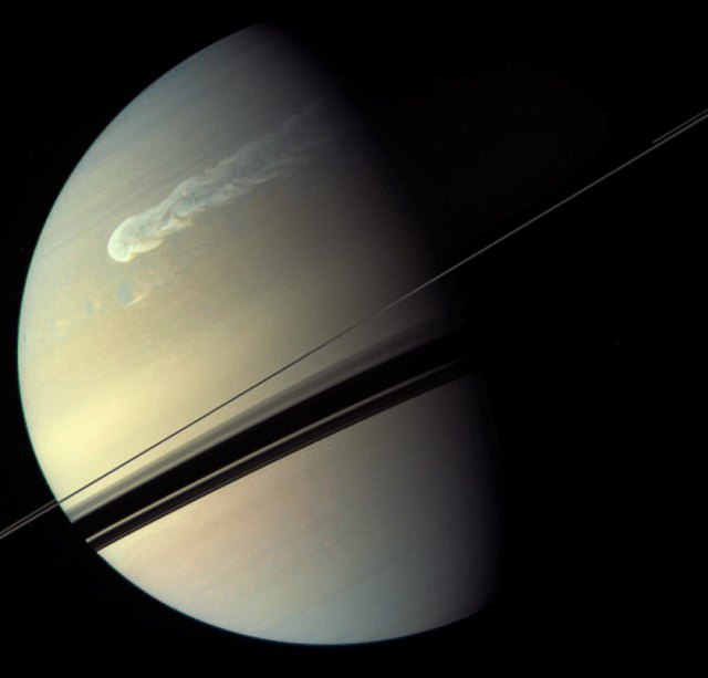 saturn_storm_cassini_global_color_regan_20110206